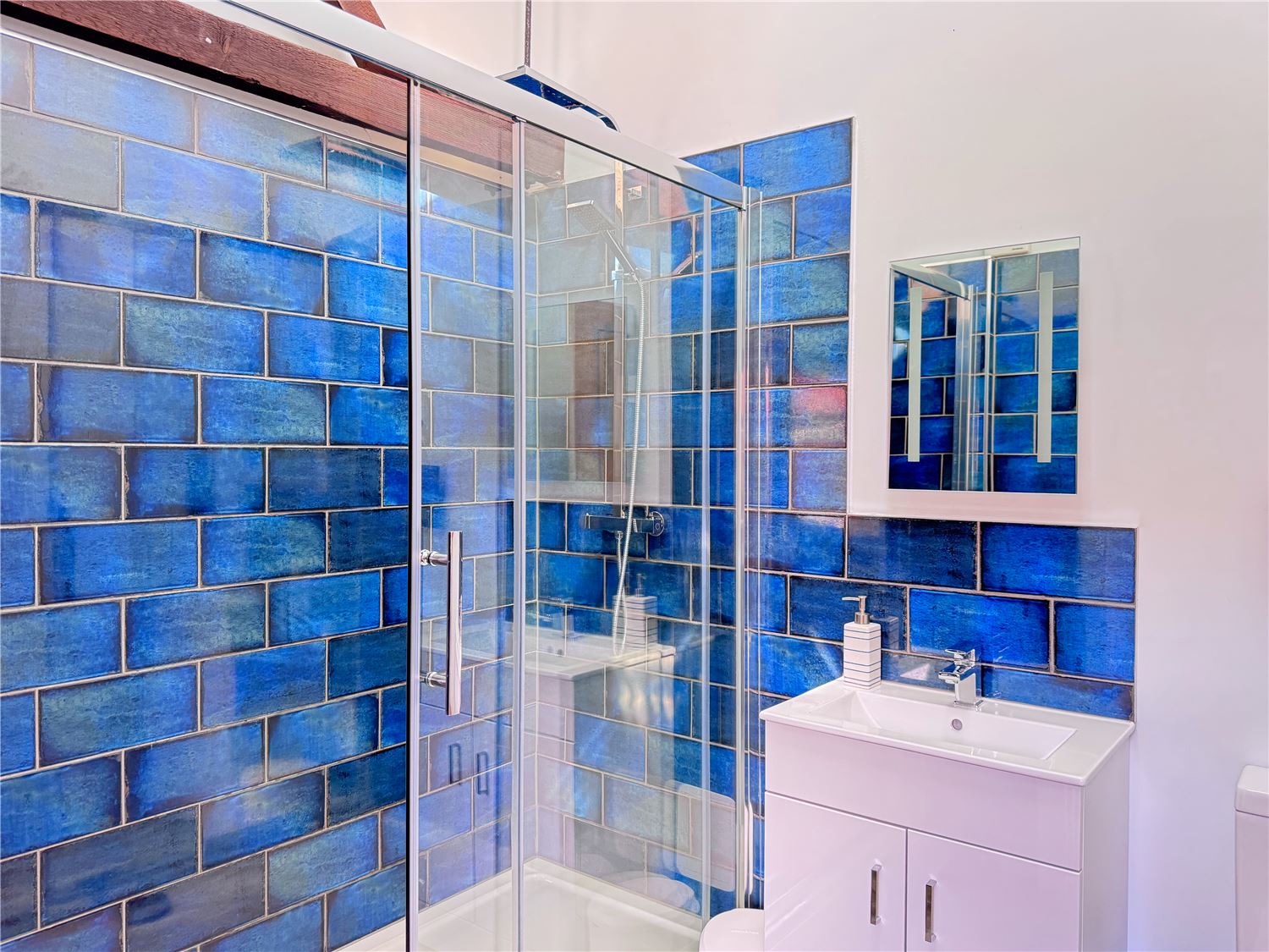 Bathroom with shower at dog-friendly Norfolk Broads holiday cottage sleeps 6