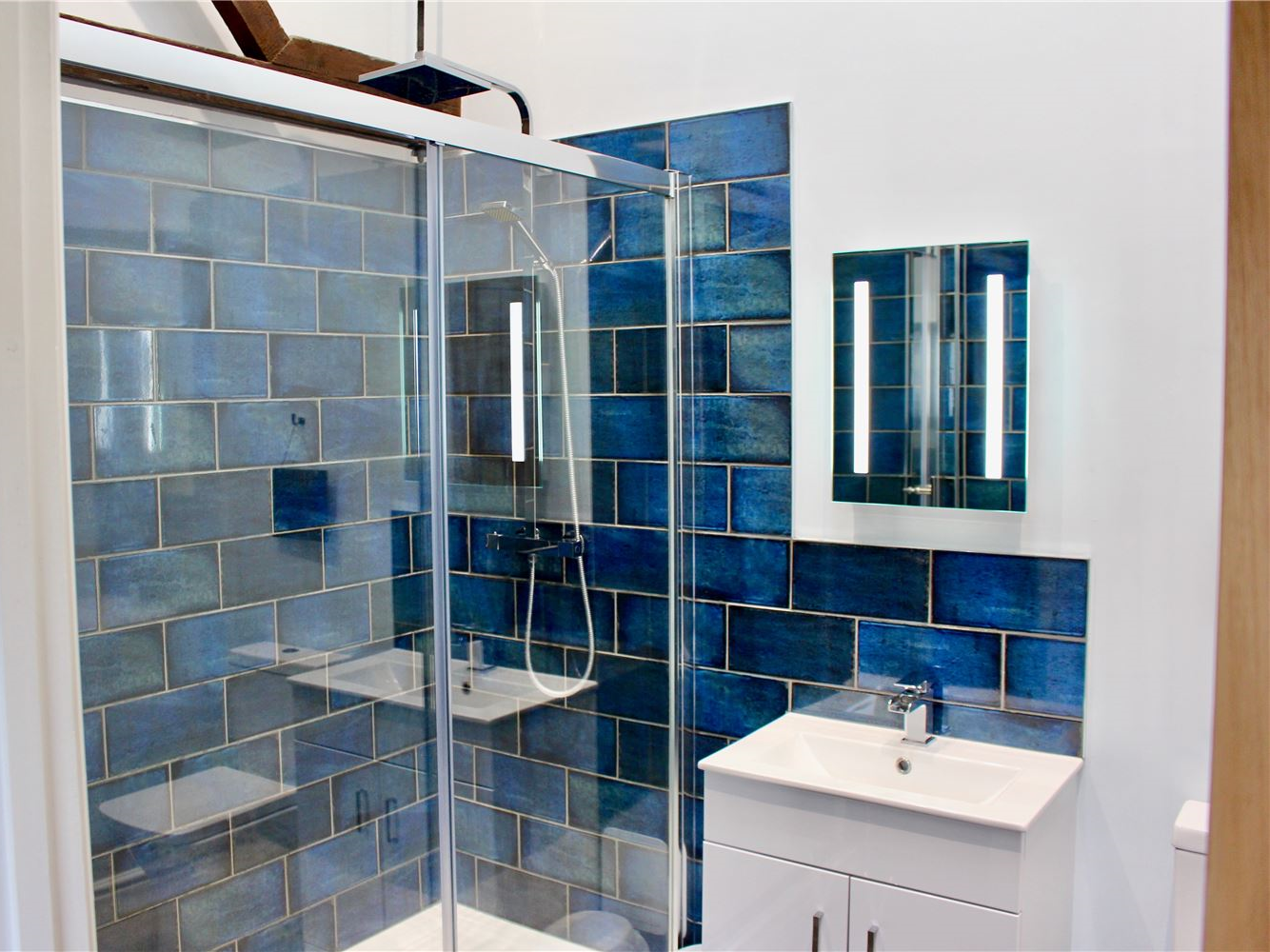 Bathroom with shower at dog-friendly Norfolk Broads holiday cottage sleeps 6