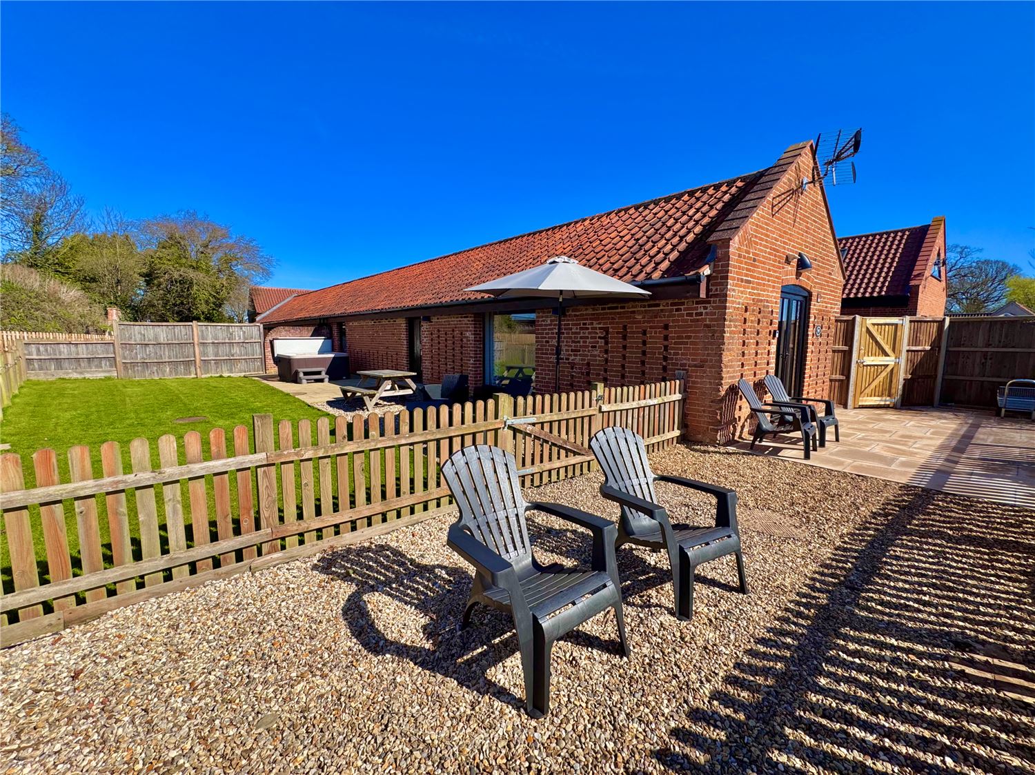 Large enclosed outdoor garden at dog friendly Norfolk Broads holiday let sleeping 4