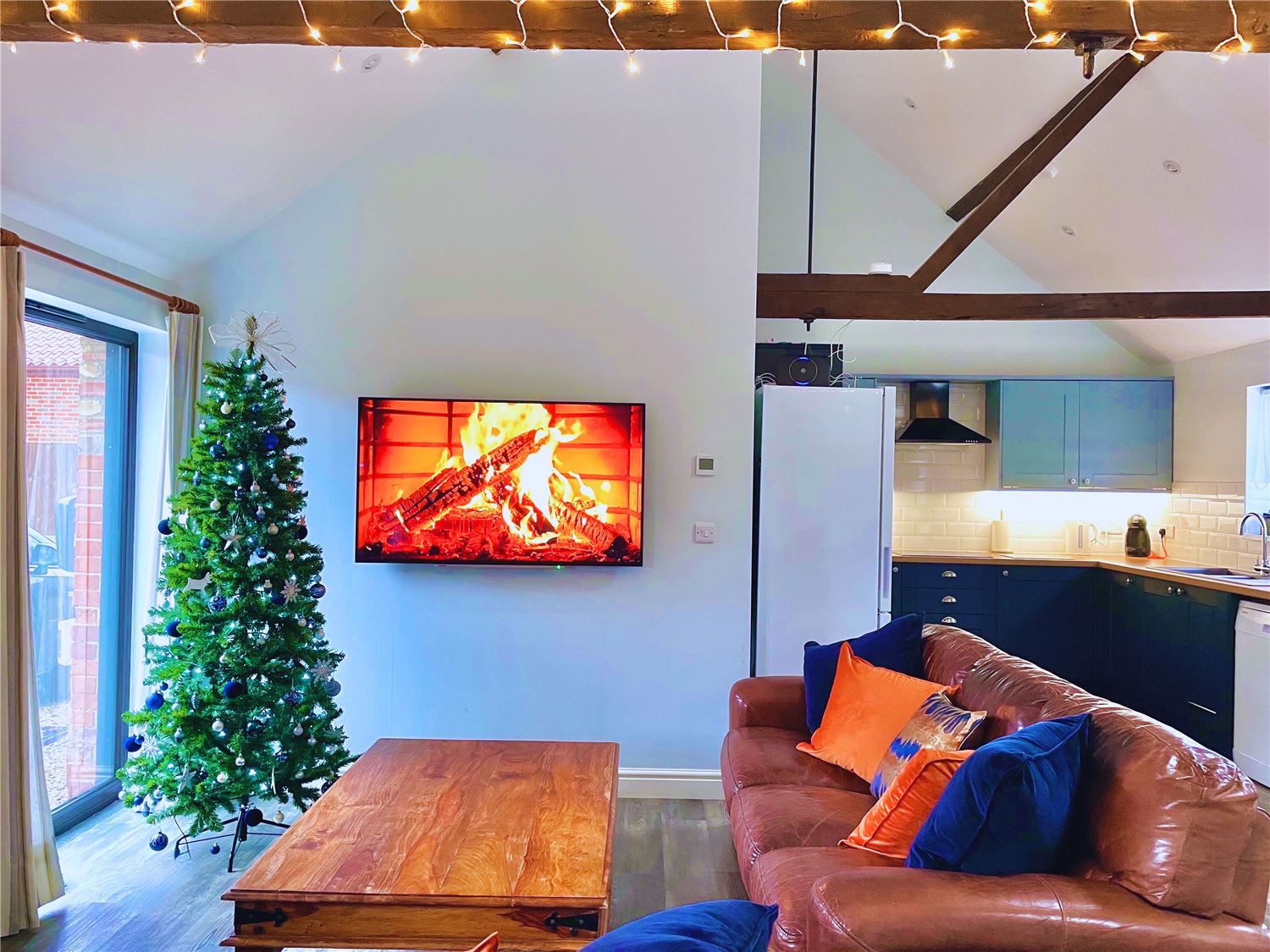 Spacious open plan living decorated for Christmas and New Year with fully equipped kitchen at dog friendly, Norfolk Broads holiday cottage for 6