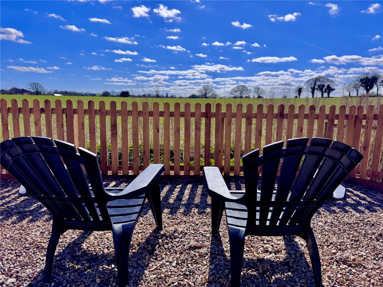 Large enclosed patio with countryside views at dog friendly Norfolk Broads holiday let sleeping 4